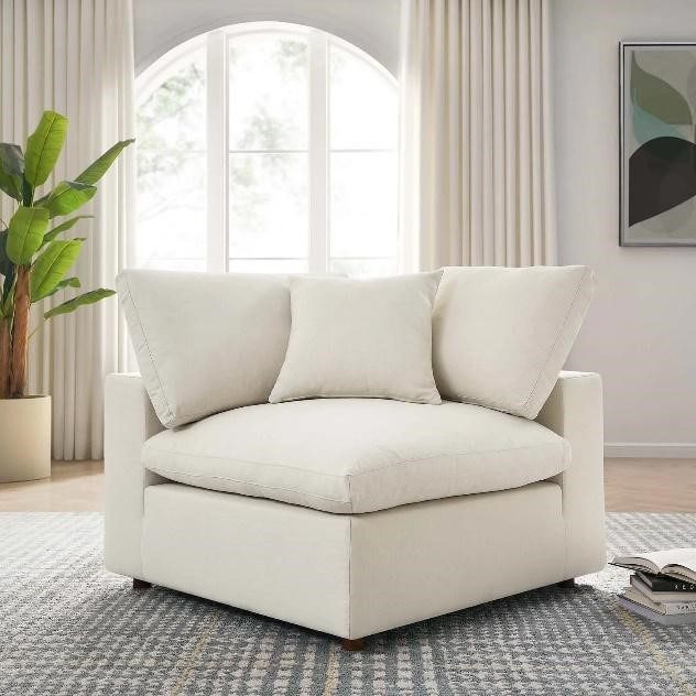 white comfy chair in bedroom