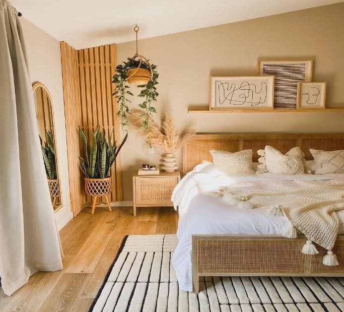greenery in bedroom with decorative sign