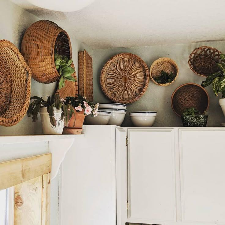 Woven planter above kitchen cabinet