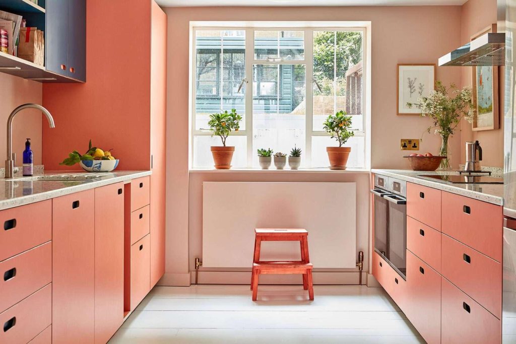 Peach contrast kitchen walls and cabinet