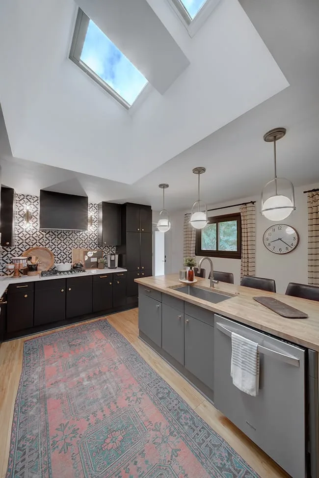 skylight in modern kitchen with hanging lights