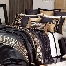 black and chocolate velvet pillows on king size bed